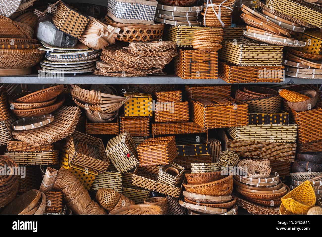 Traditional Vietnamese rattan woven wicker baskets and containers on ...