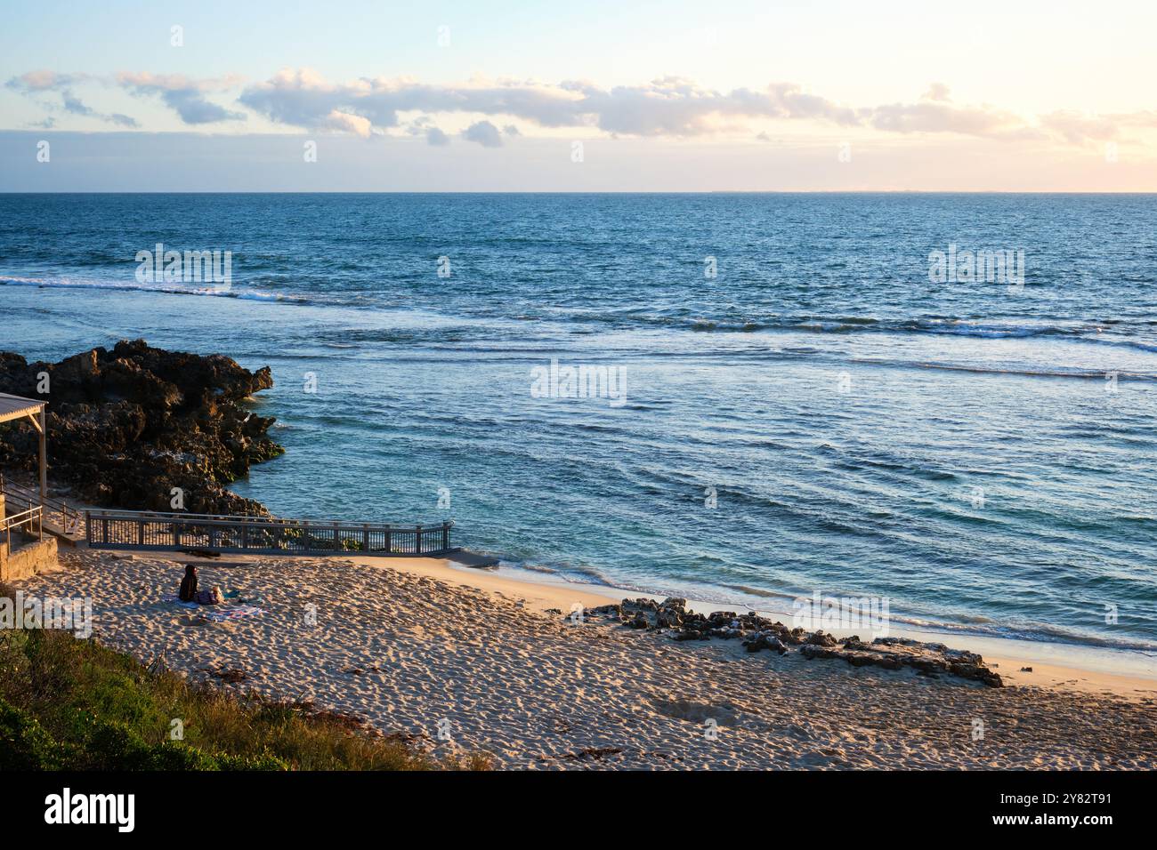 A view over Mettam's Pool at sunset including the recently replaced disability access ramp, a beach in Perth, Western Australia. Stock Photo