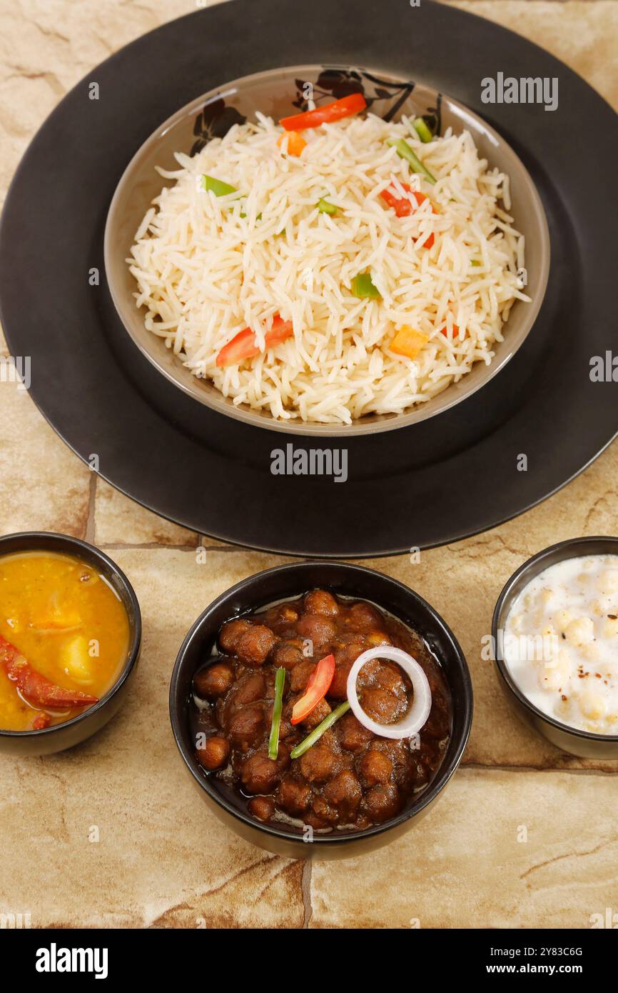 Chole Chawal or Chana Masala With Veg Pulao,Raita, Indian dish Stock ...