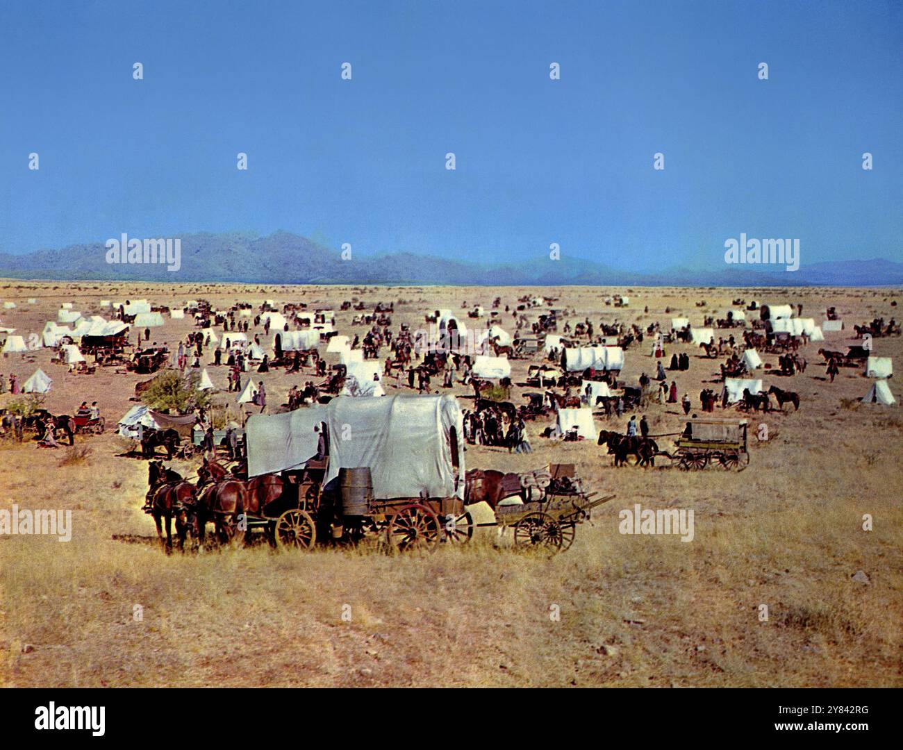 Covered wagons during Oklahoma land rush, on-set of the western film ...