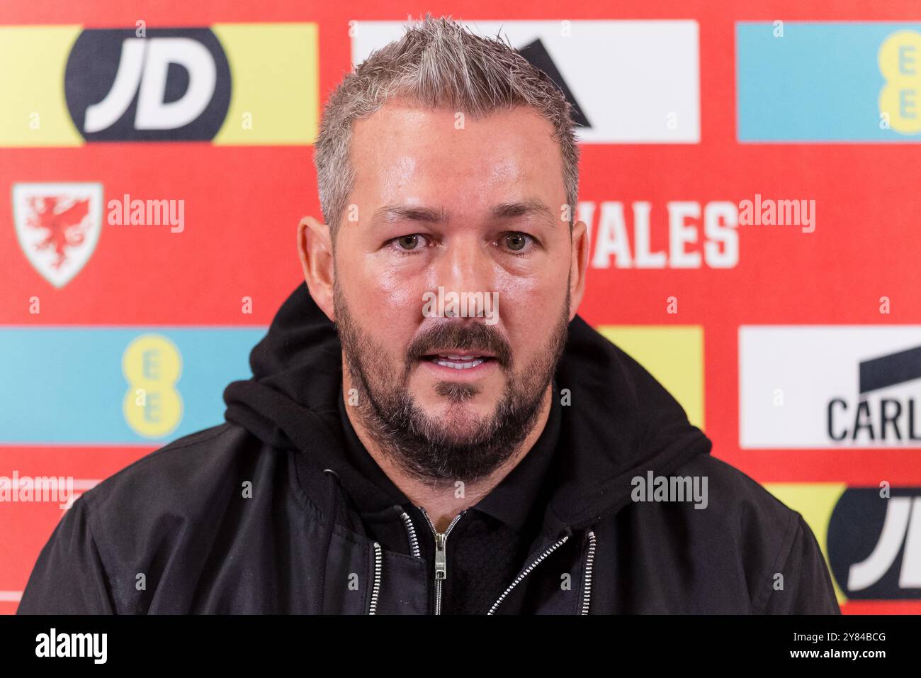 CARDIFF, UK. 28th Aug, 2024. Wales U21 National Team Manager Matty ...