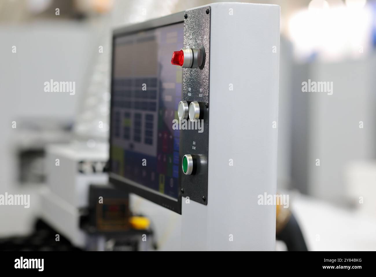 Modern industrial touch screen control console. Selective focus. Stock Photo