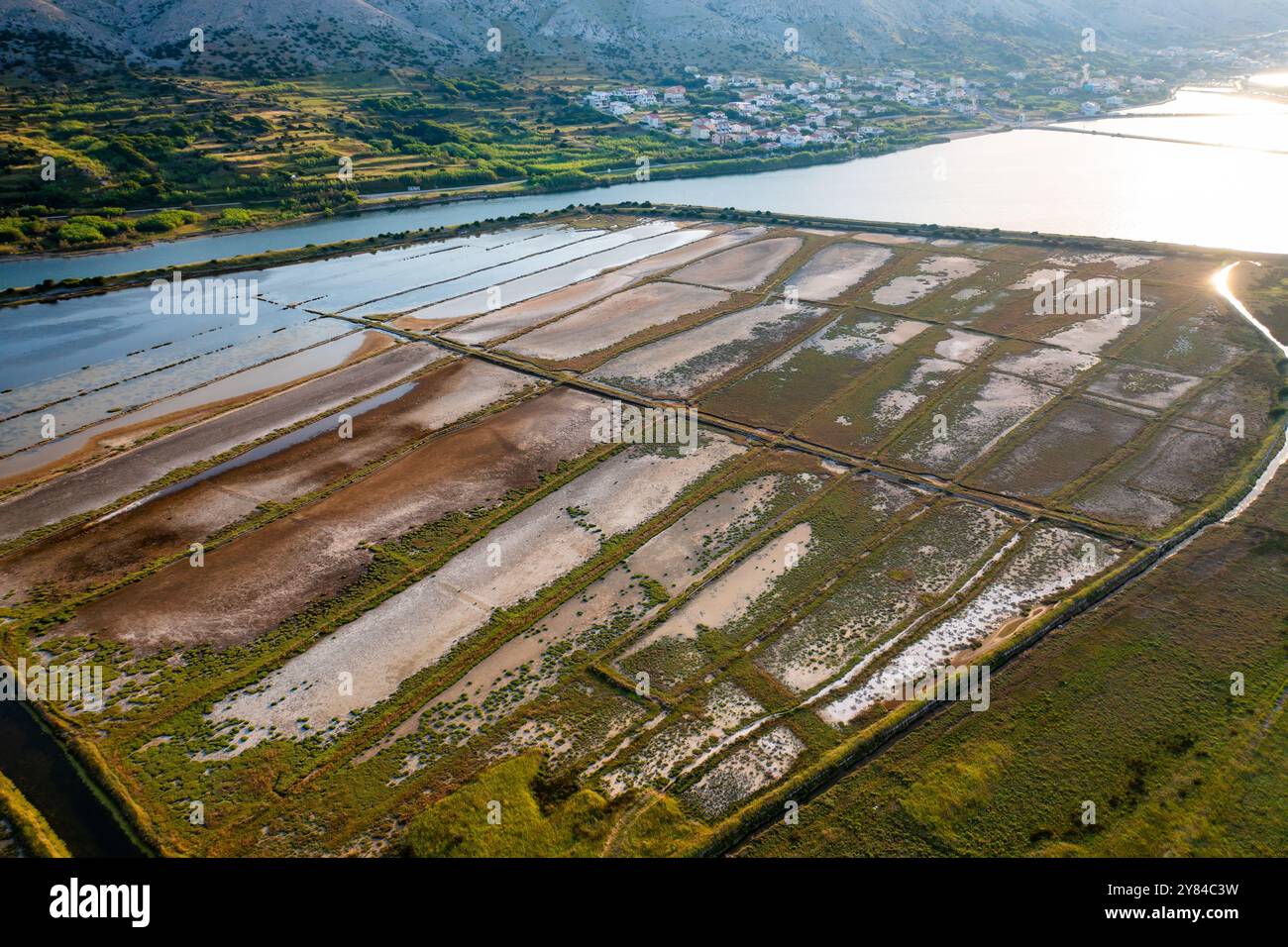 Salt pans reveal intricate patterns from seawater evaporation for salt ...