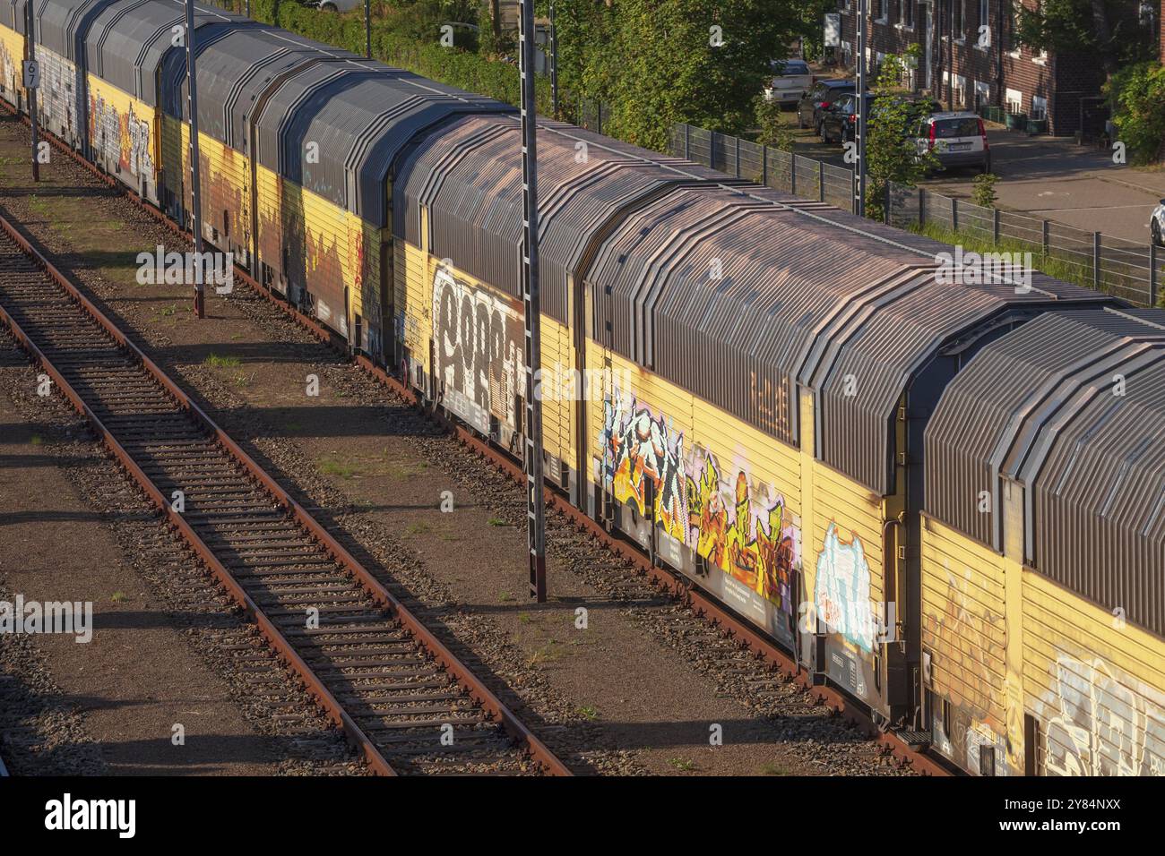 Colourfully painted goods train with freight wagons from a bird's eye view, Bremen, Germany, Europe Stock Photo