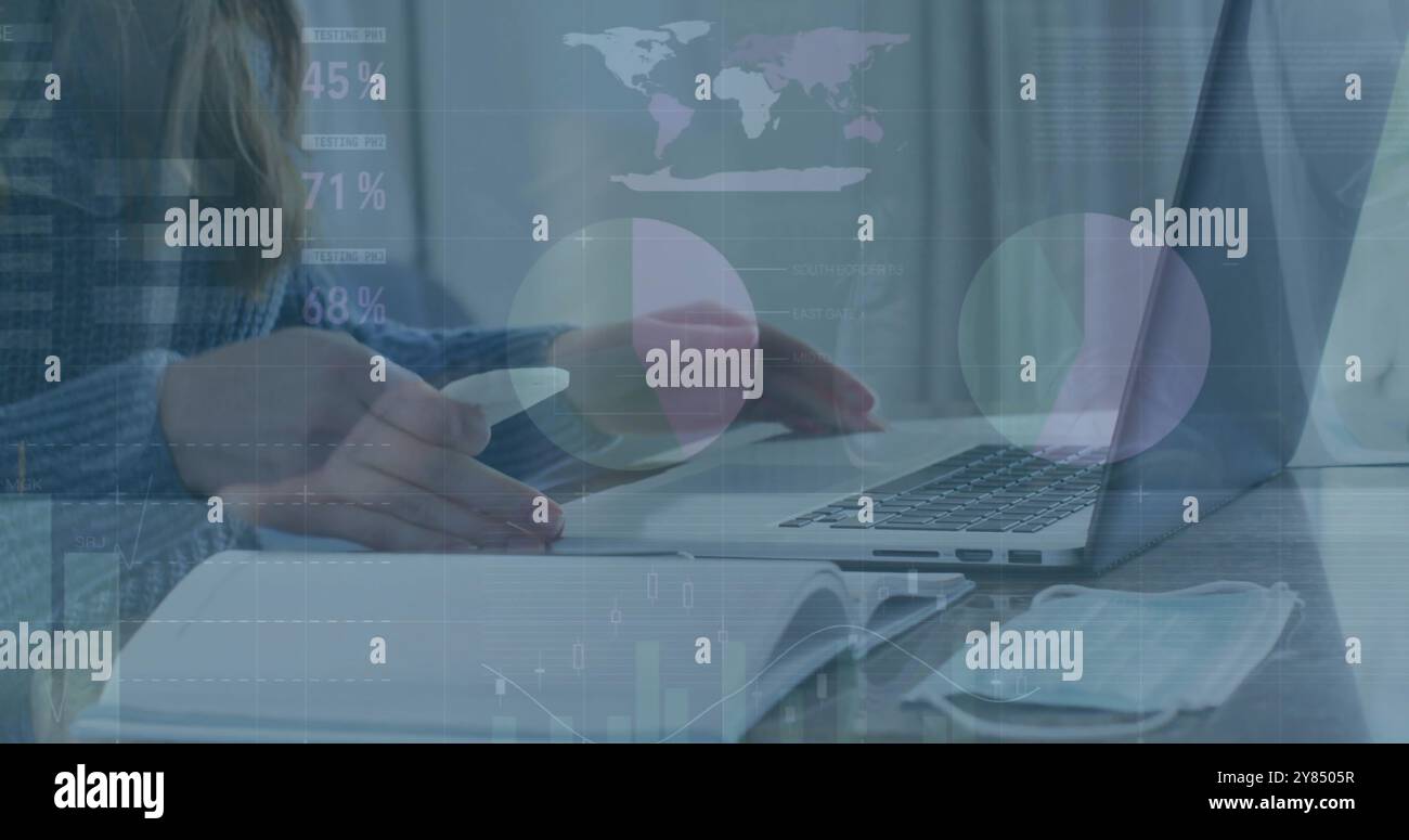 Image of data processing over caucasian woman using laptop Stock Photo