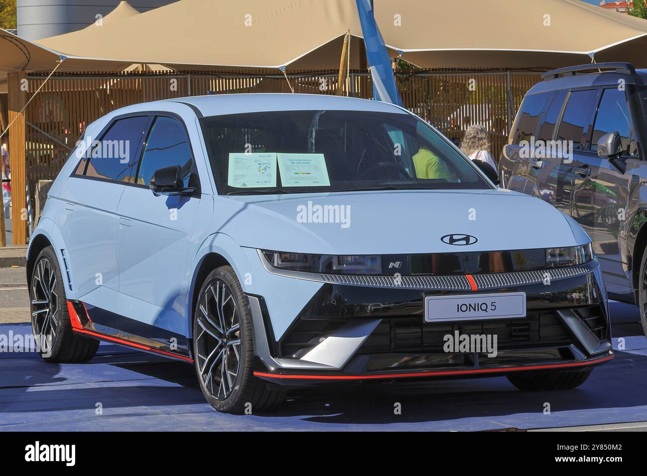 Light blue hyundai ioniq 5 n electric car is parked showing its front ...