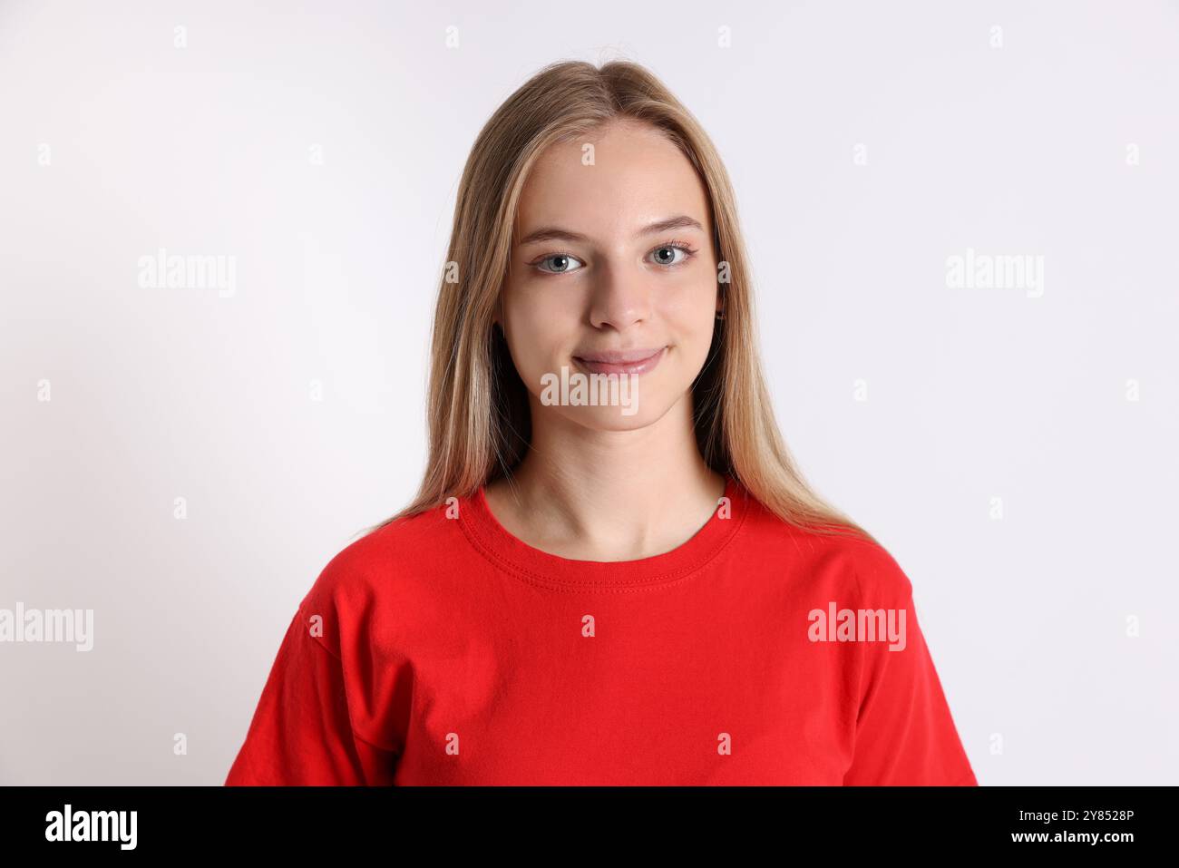 Portrait of teenage girl on white background Stock Photo - Alamy