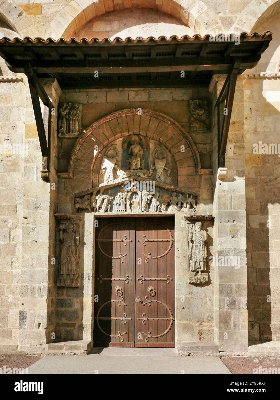Clermont Ferrand. Tympanum of the romanesque church of Notre Dame du Port. Puy de Dome department. Auvergne Rhone Alpes. France - Smartphone Captured Stock Image