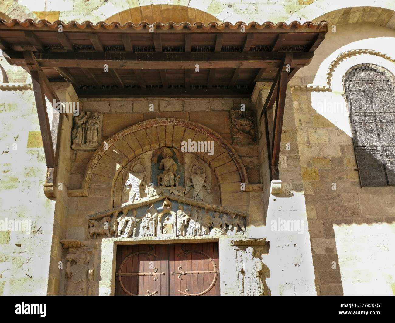Clermont Ferrand. Tympanum of the romanesque church of Notre Dame du Port. Puy de Dome department. Auvergne Rhone Alpes. France - Smartphone Captured Stock Image