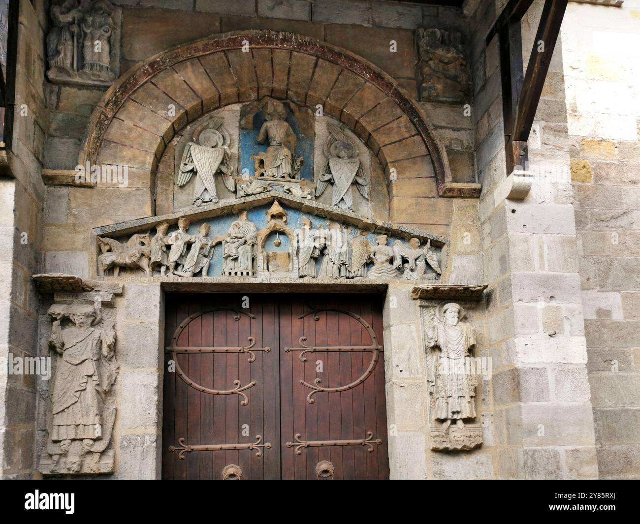 Clermont Ferrand. Tympanum of the romanesque church of Notre Dame du Port. Puy de Dome department. Auvergne Rhone Alpes. France - Smartphone Captured Stock Image