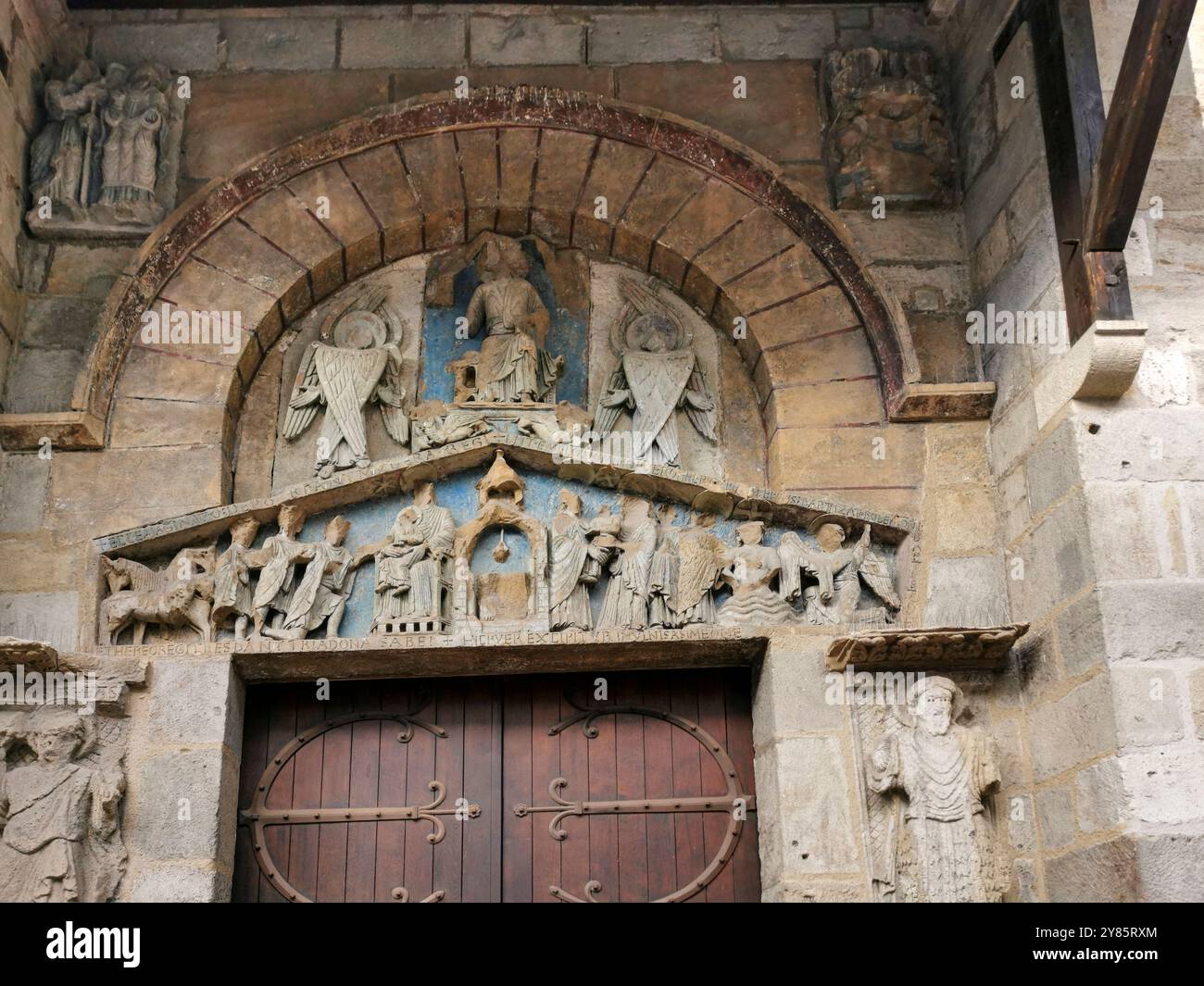 Clermont Ferrand. Tympanum of the romanesque church of Notre Dame du Port. Puy de Dome department. Auvergne Rhone Alpes. France - Smartphone Captured Stock Image