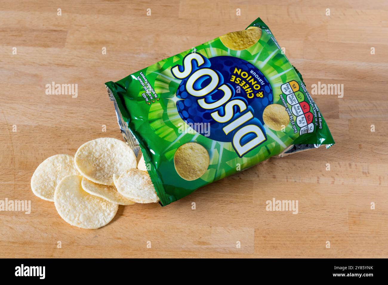 An open packet of cheese & onion flavoured Discos, a potato snack. Stock Photo