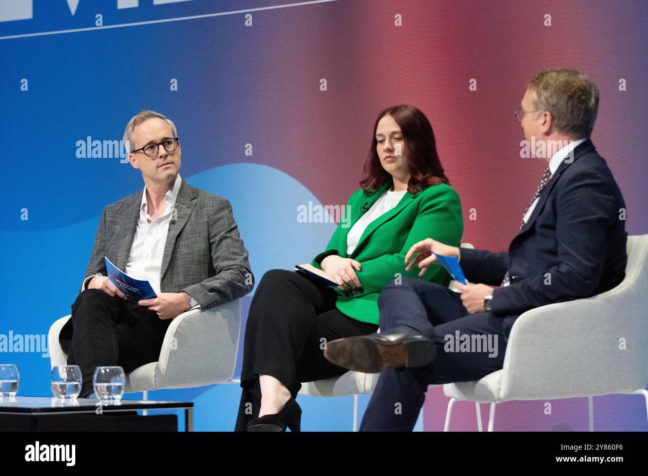 Sebastian Payne , 'Think Tank' Director conducts discussion on Main stage  with Lord Stephen Parkinson, (Baron Parkinson of Whitley Bay)  and Emma Revell , External Affairs Director at the CPS, at Conservative Conference 2024. The Conference ran from Sunday 29th September 2024 until Wednesday 2nd October 2024. Conservative conference  Birmingham UK Picture: garyroberts/worldwidefeatures.com Stock Photo