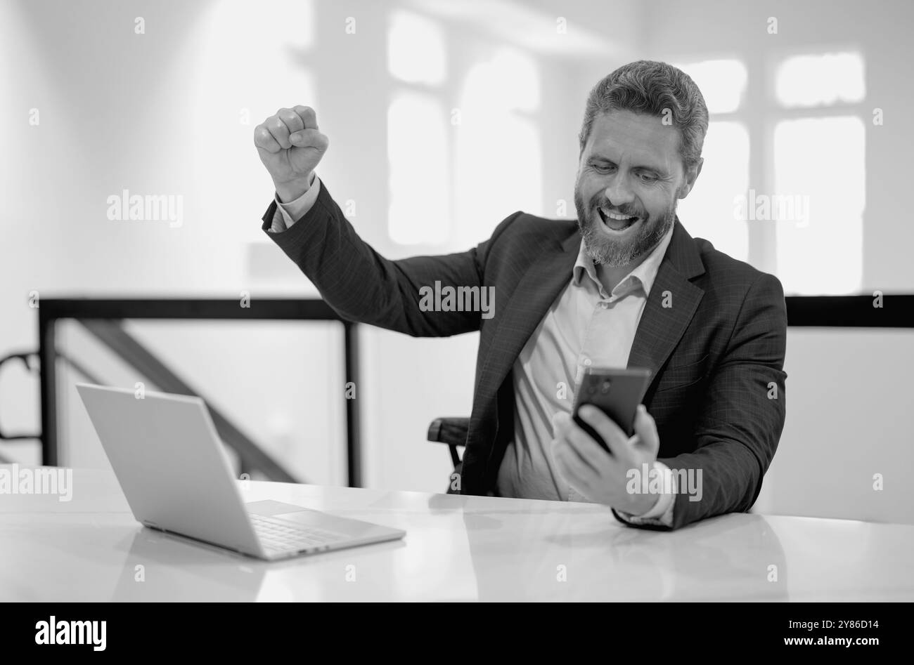 Angry middle aged man using Black and White Stock Photos & Images - Alamy