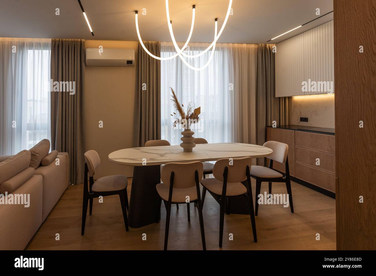Dining area in modern luxury apartment Stock Photo - Alamy