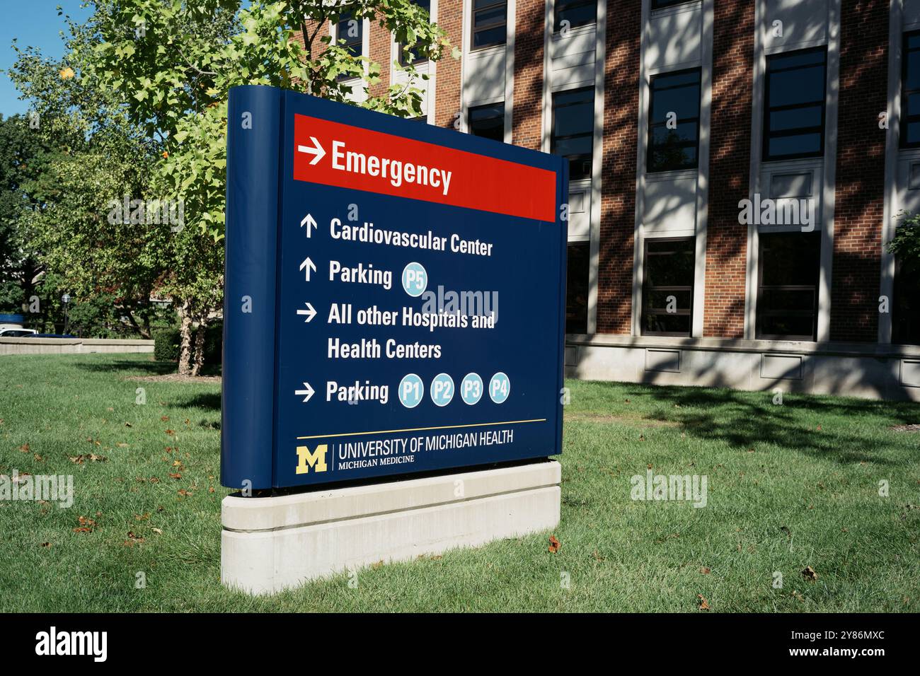 A sign directing to various University of Michigan Health facilities, in Ann Arbor Michigan USA Stock Photo