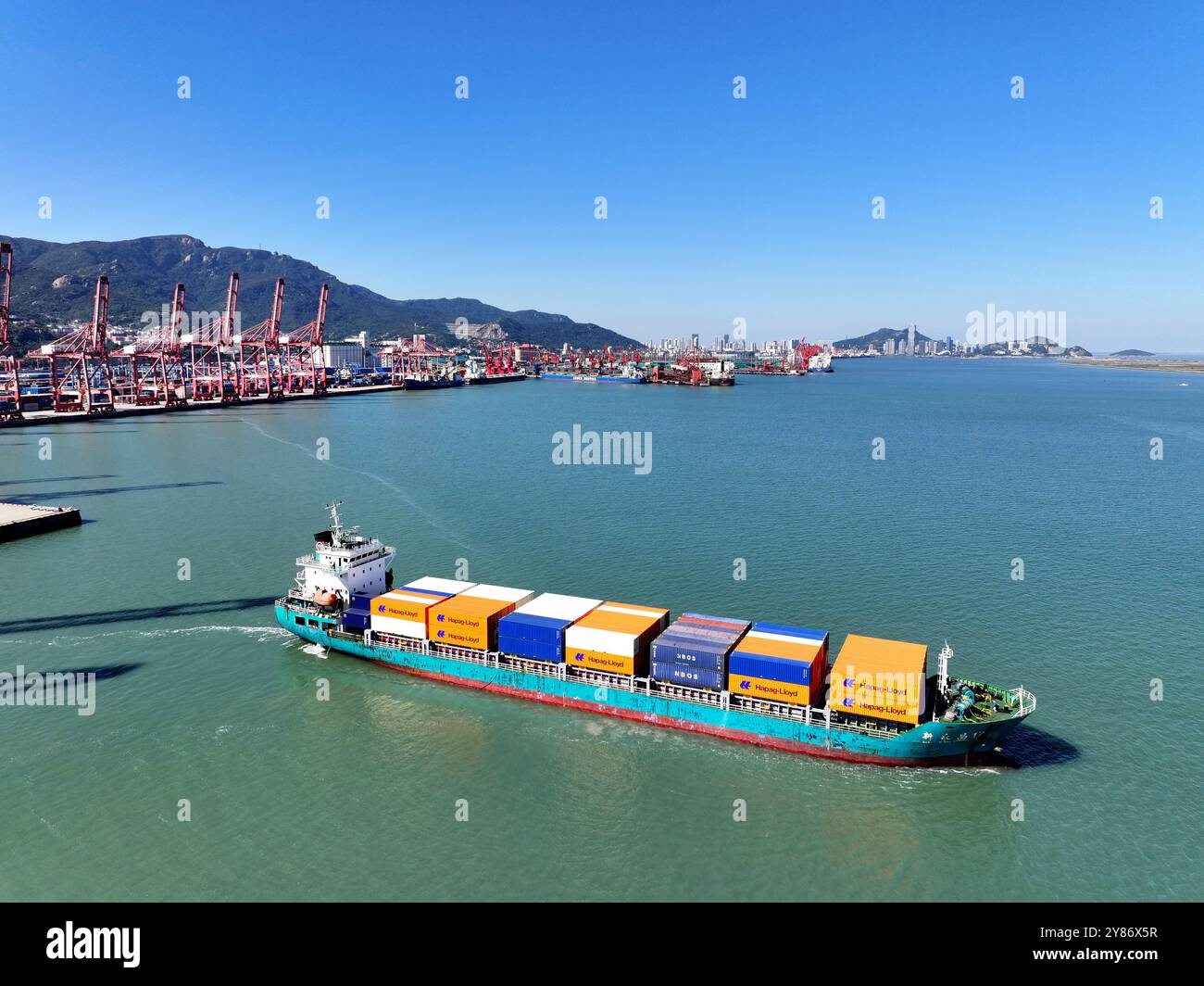 LIANYUNGANG, CHINA - OCTOBER 3, 2024 - A cargo ship loaded with ...