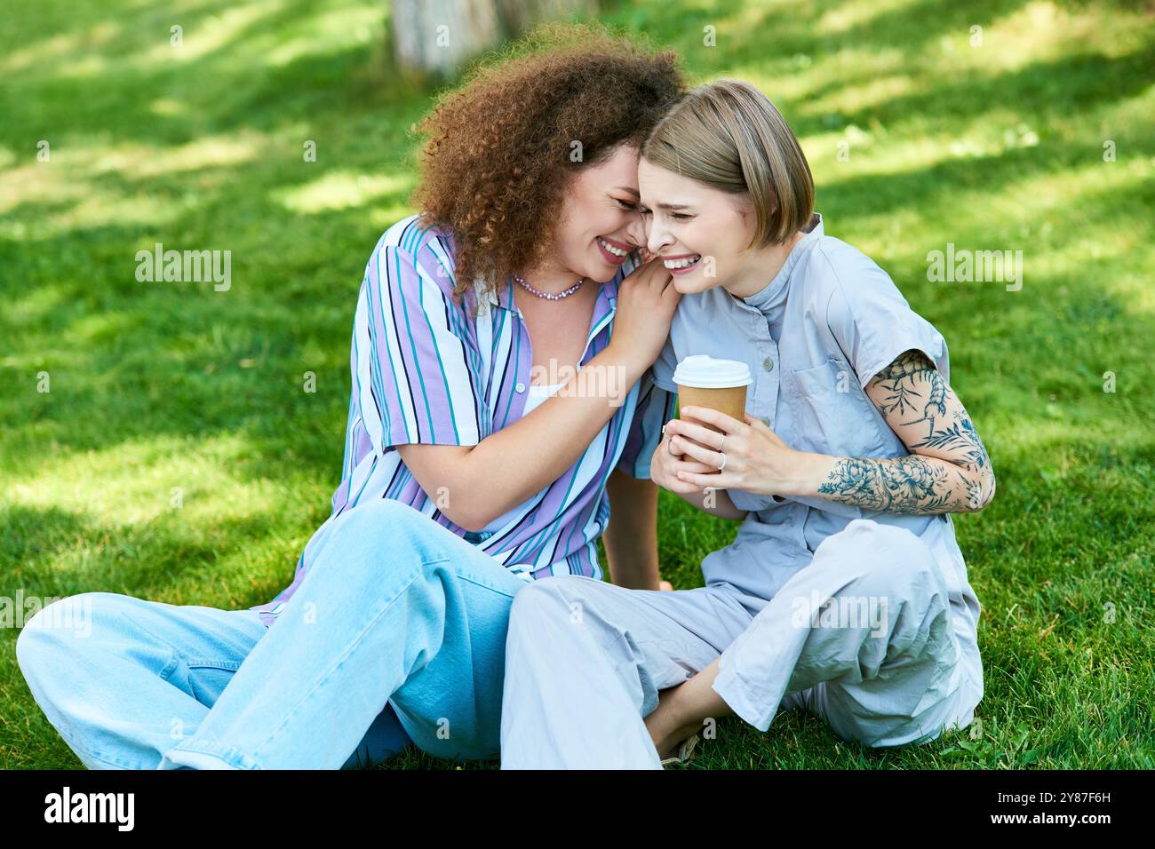 Two women laughing joyously hi-res stock photography and images - Alamy