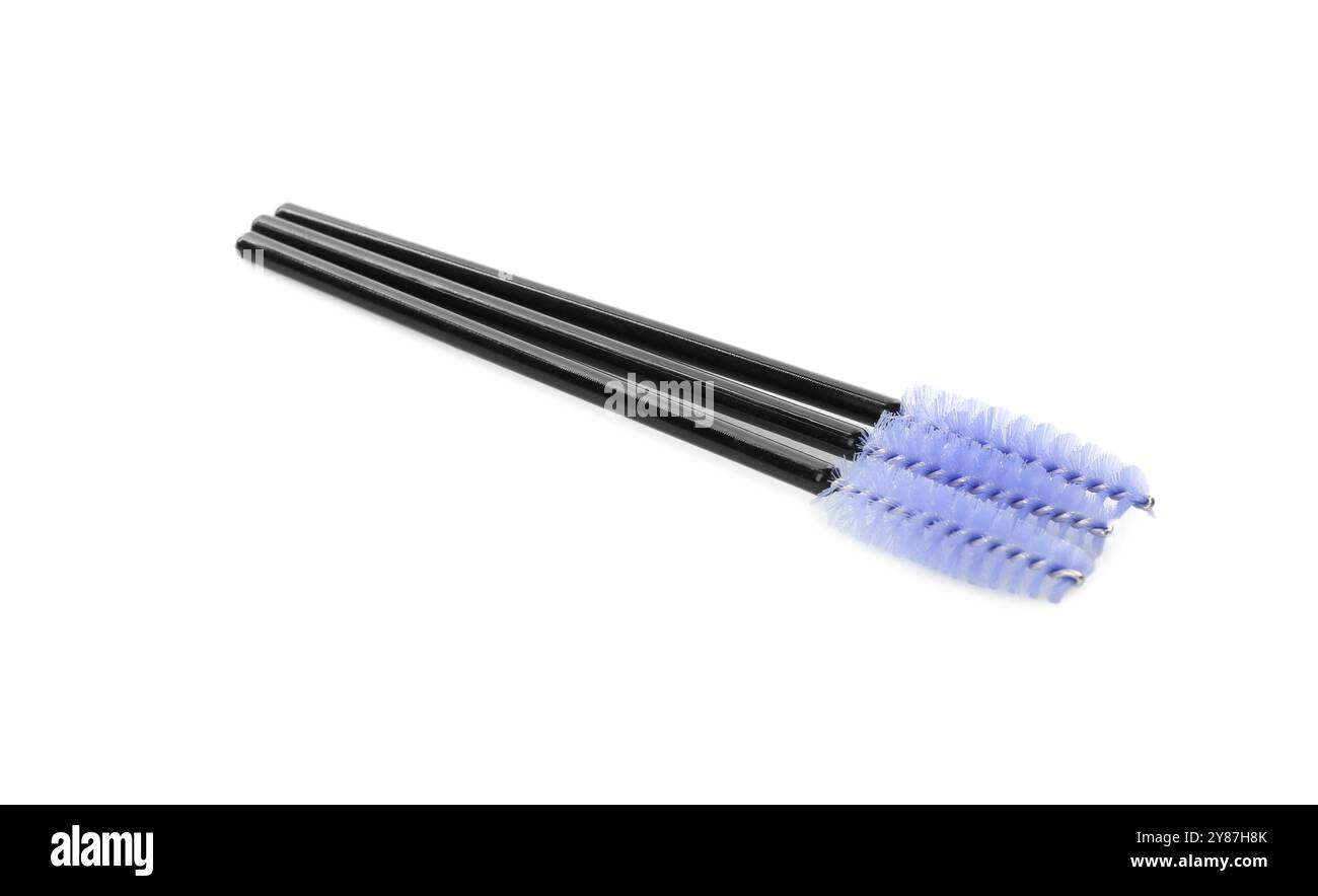 Many disposable makeup brushes isolated on white Stock Photo