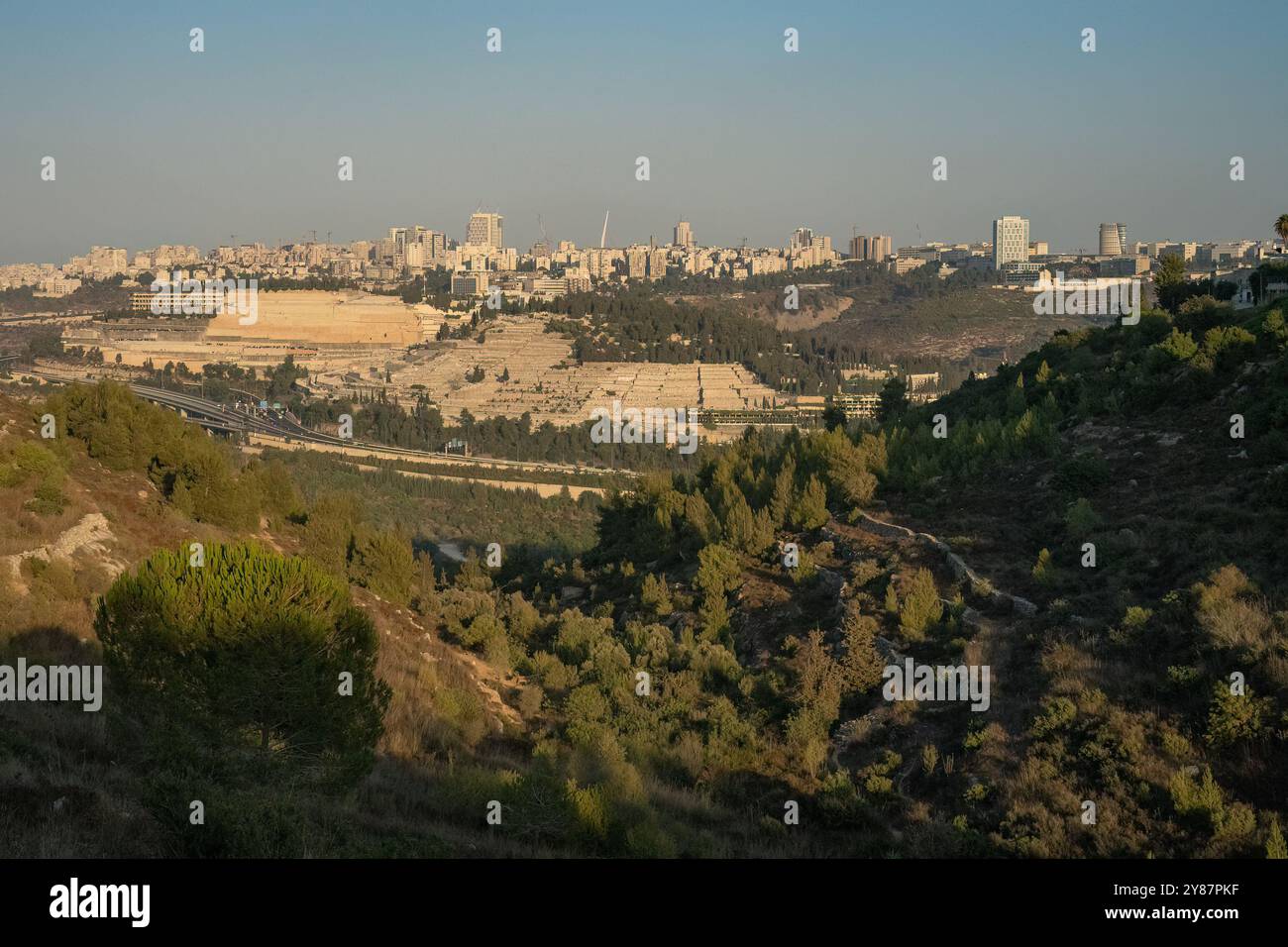 The skyline of northern Jerusalem, Israel, as seen from the Halilim stream, on a hazy summer afternoon. Stock Photo