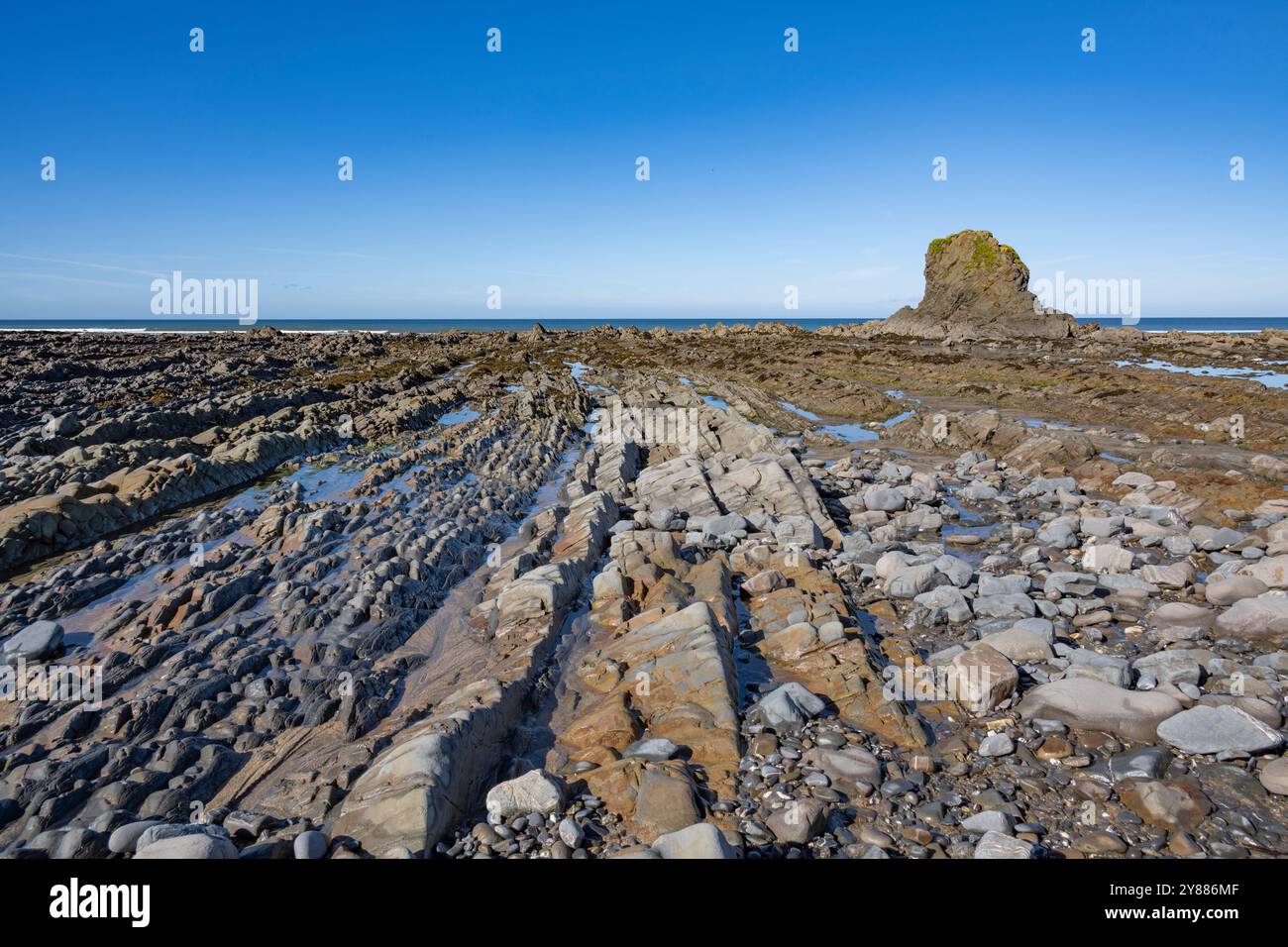 Low tide reveals amazing rocks including the famous Black Rock at ...