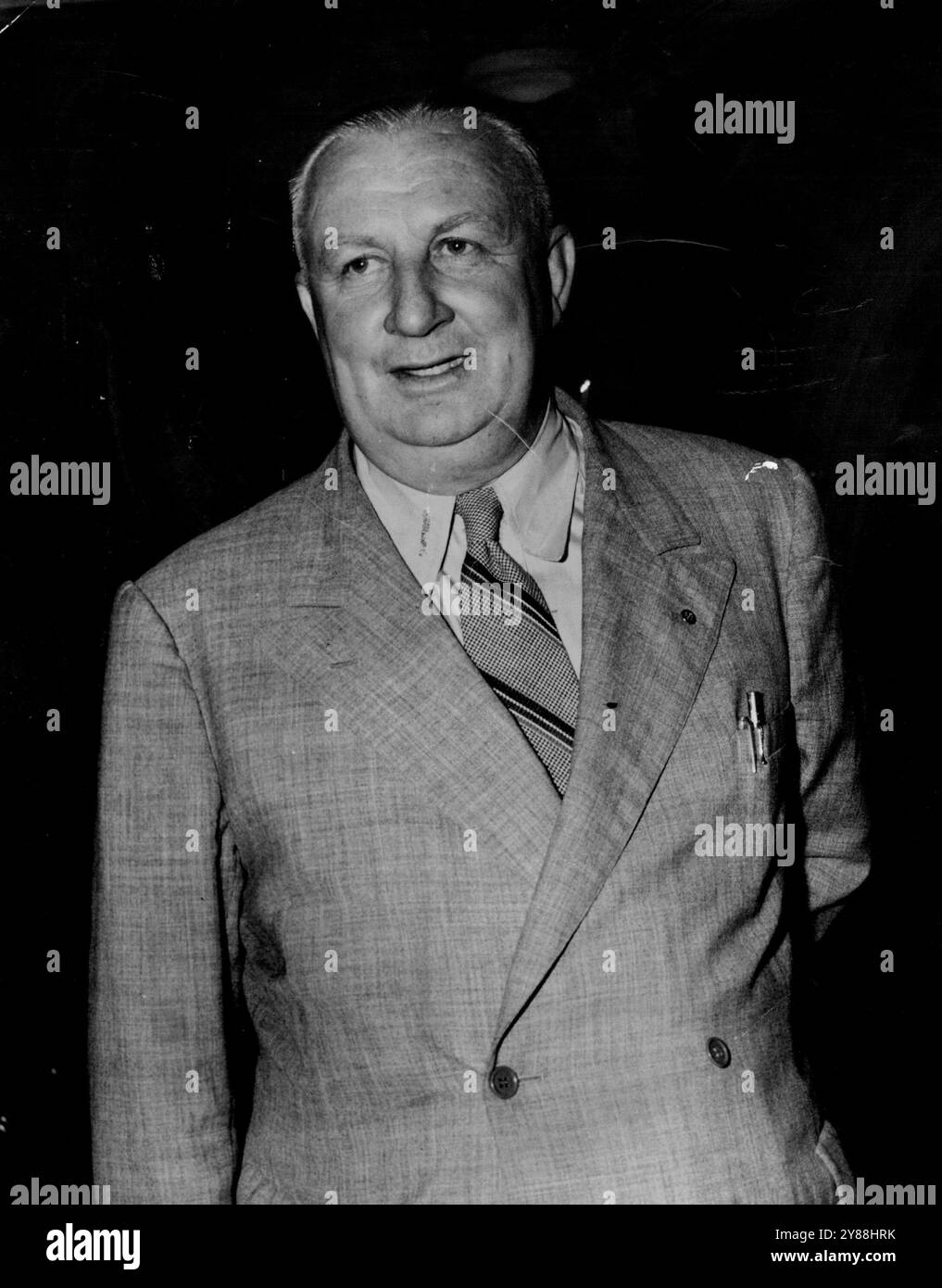 Mr. H.G. Alderson M.B.E. of Sydney arriving at Mascot by Qantas ...