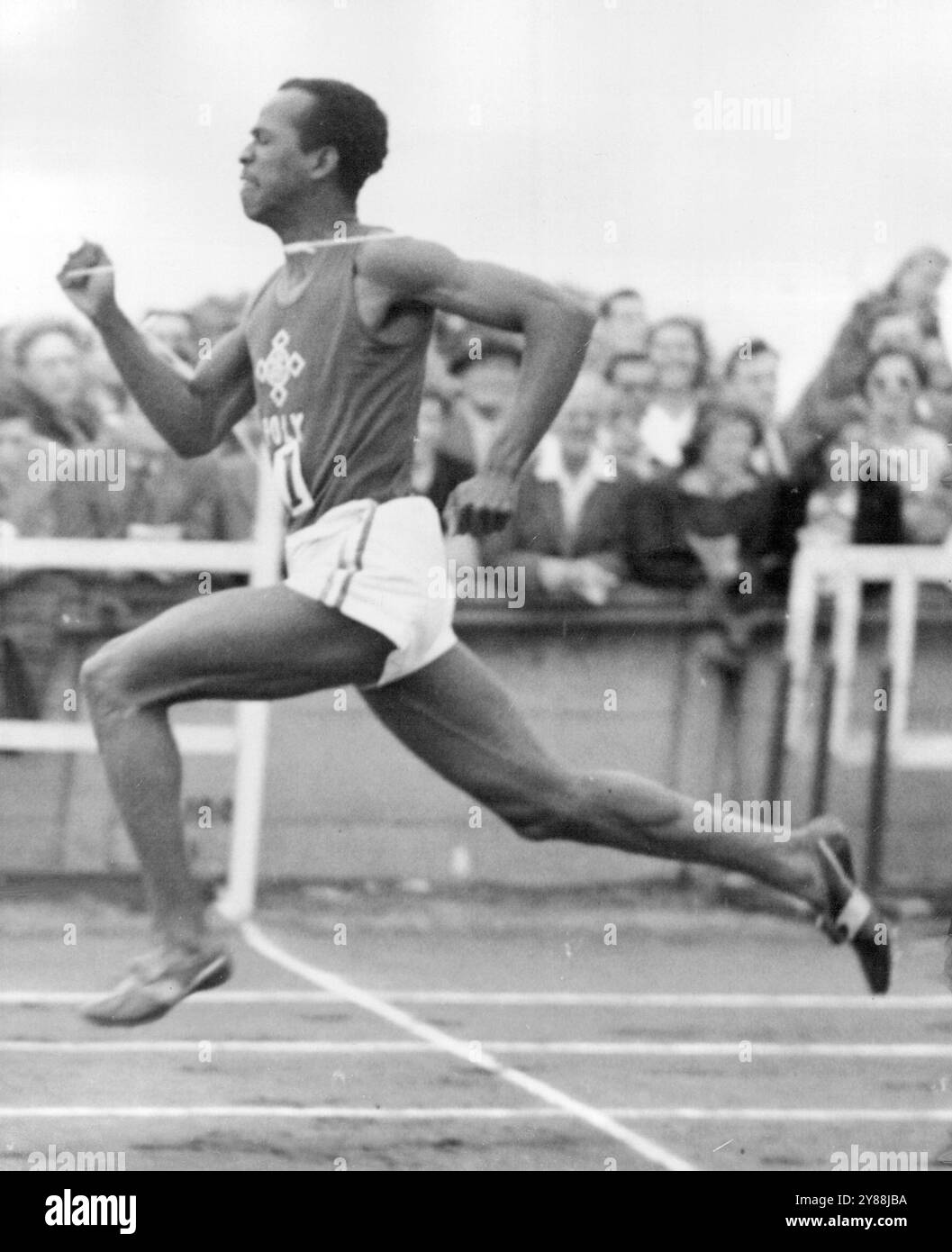 Bailey Sprints To VictoryE. McDonald Bailey racing for the Polytechnic Harriers,strides across the finish line to win the 100 yards sprint in 9,8 seconds in the Kinnaird Trophy Meeting at the Polytechnic Stadium, Chiswick, London today (Saturday).Bailey set the Kinnaird record of 9.7 seconds for the event in 1947. Today's meeting also Included non-Kinnaird Trophy events, one of them being the Marathon Race. June 17, 1950. (Photo by Reuterphoto). Stock Photo