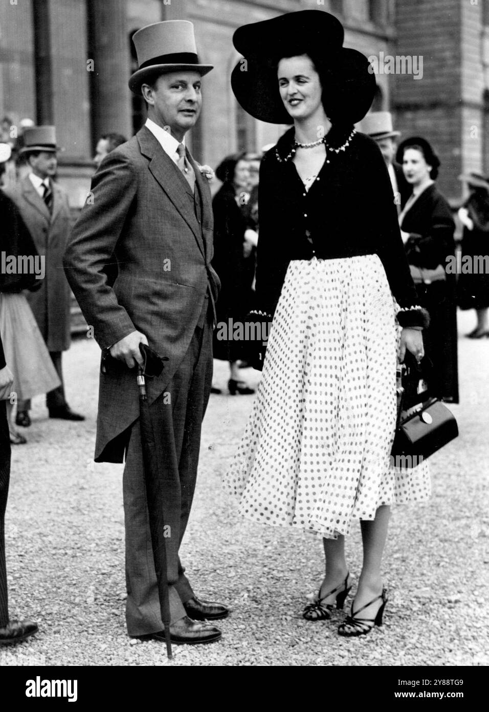 Garden Party At Blenheim -- Lord Astor and Lady Sarah Russell were among the guests at a garden party held at Blenheim palace, and given by the Duke and Duchess of Marlborough for twelve hundred coronation visitors. June 08, 1953. Stock Photo