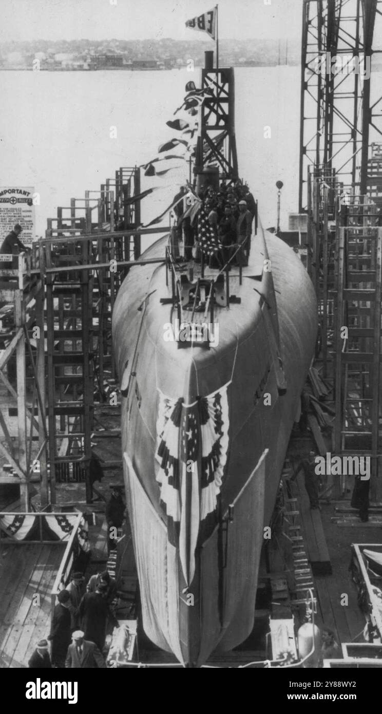 Navy's Anti-Submarine Sub Launched -- The K-1, the Navy's new submarine for use against submarines, rests on the ways at the Electric Boat Company here today just before her launching. The first new -type submarine to be launched since the End of World Wax II, the K-1 is equipped with the latest developments in sonar and electronic detection equipment. It has a displacement of 750 tons; is 195 feet long and was built primarily for searching out and destroying enemy submarines. March 2, 1951. (Photo by AP Wirephoto). Stock Photo