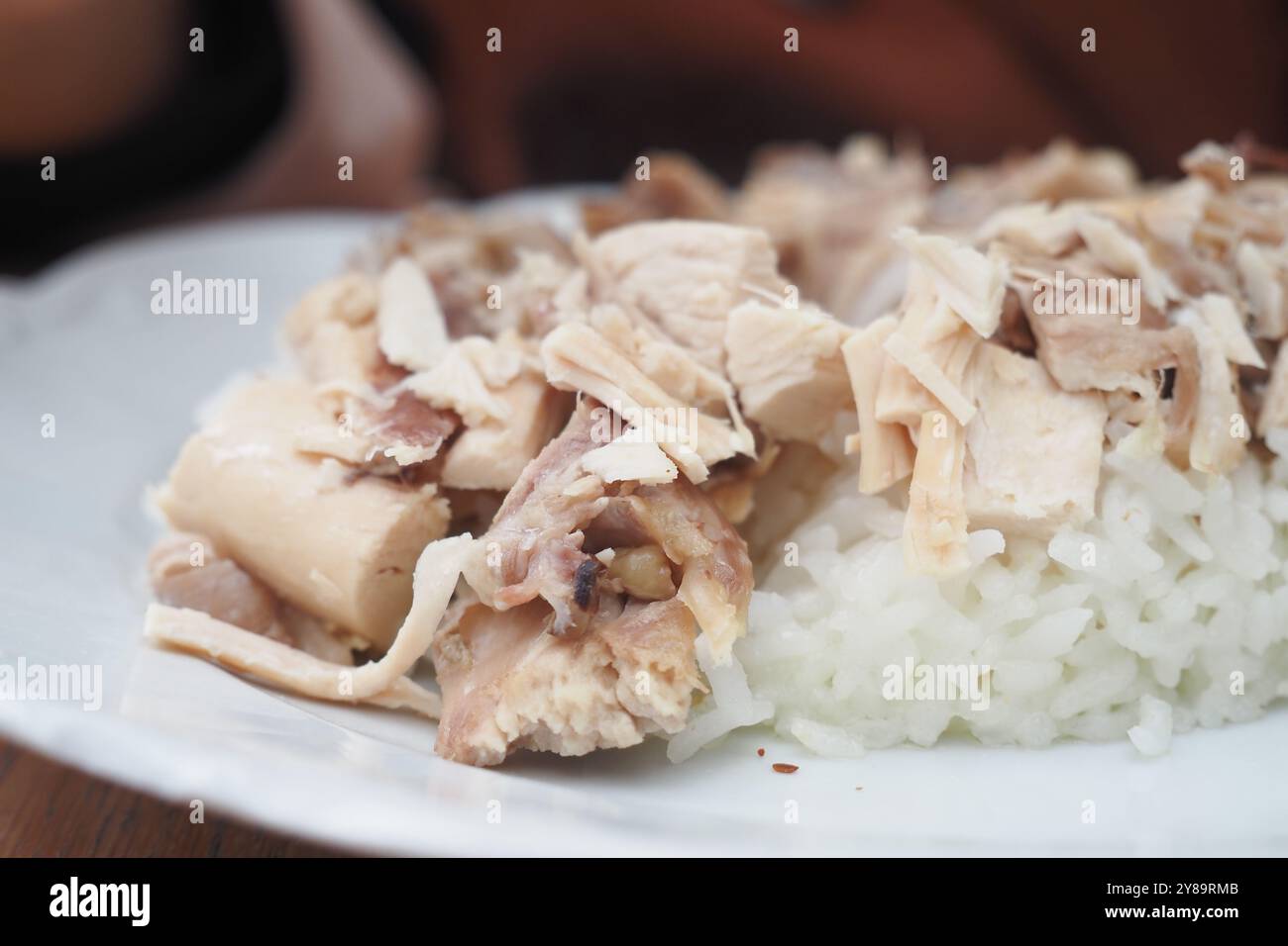 Boiled chicken, steamed rice, pink plate Stock Photo - Alamy