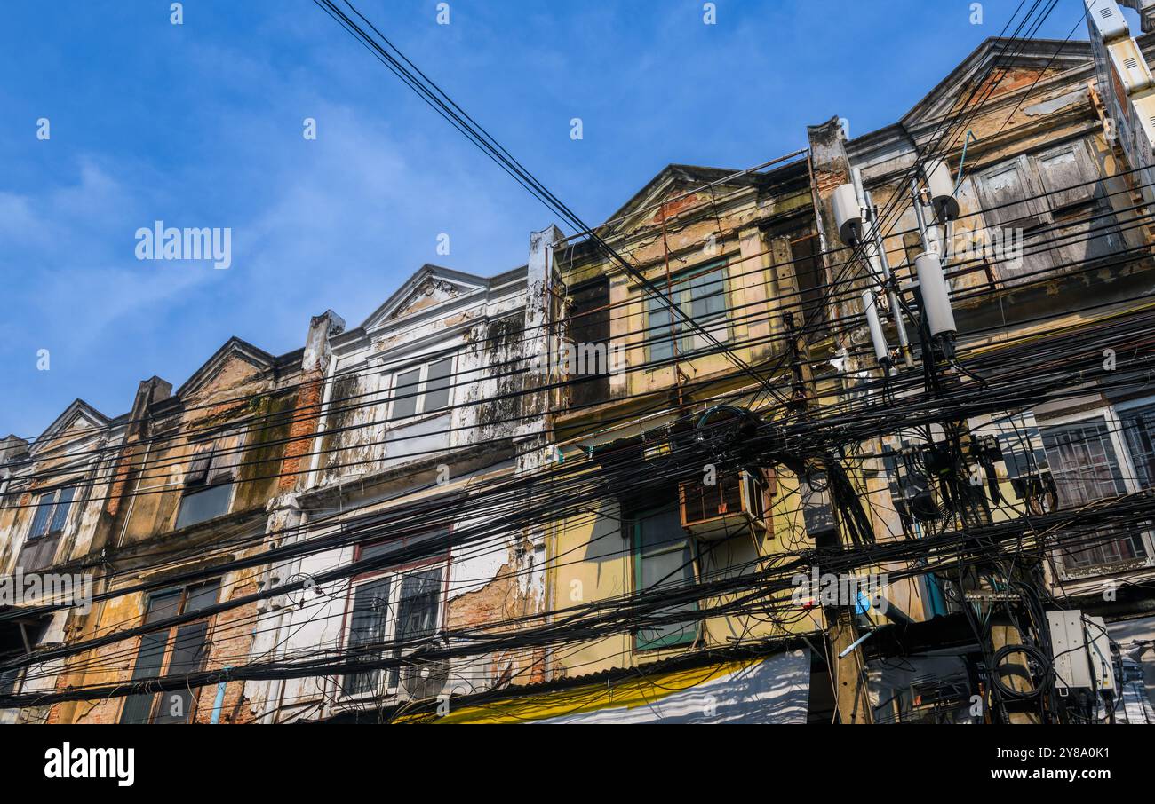Old building, over 100 years old, located in the old part of Bangkok, can be seen everywhere from public roads, Thailand. Stock Photo