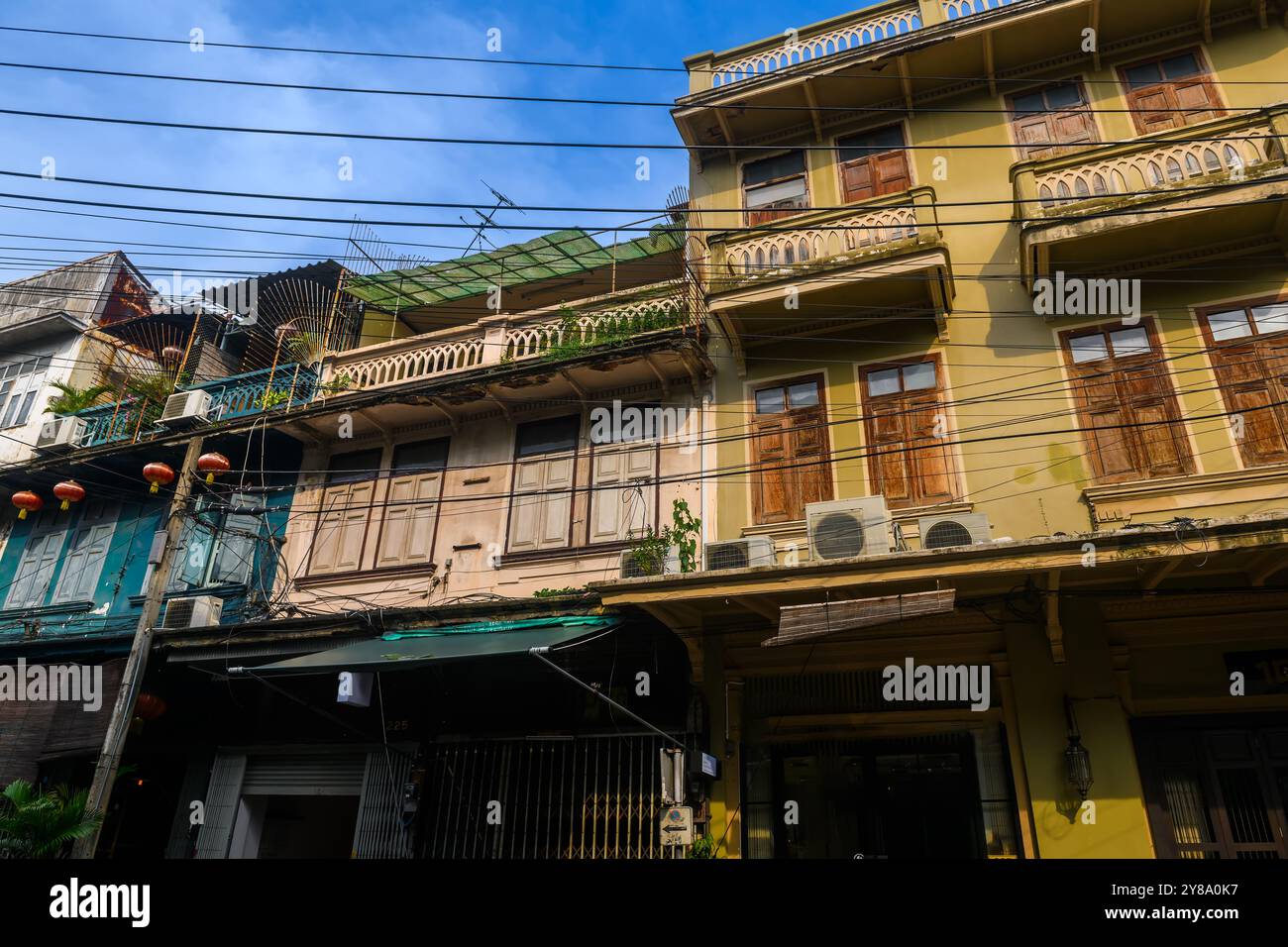 Old building, over 100 years old, located in the old part of Bangkok, can be seen everywhere from public roads, Thailand. Stock Photo