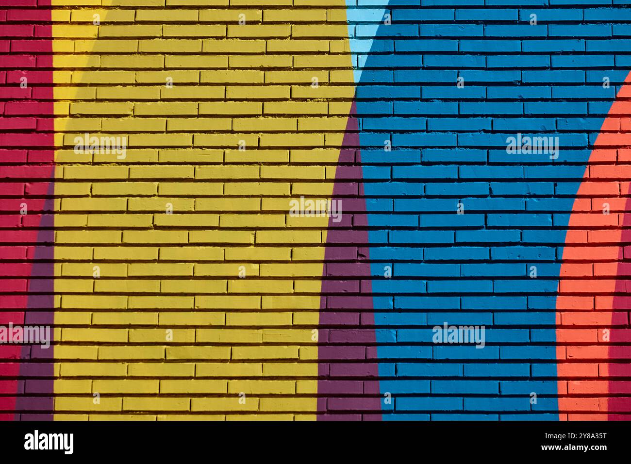 Multi colored abstract textured background. Colored brick wall backdrop Stock Photo