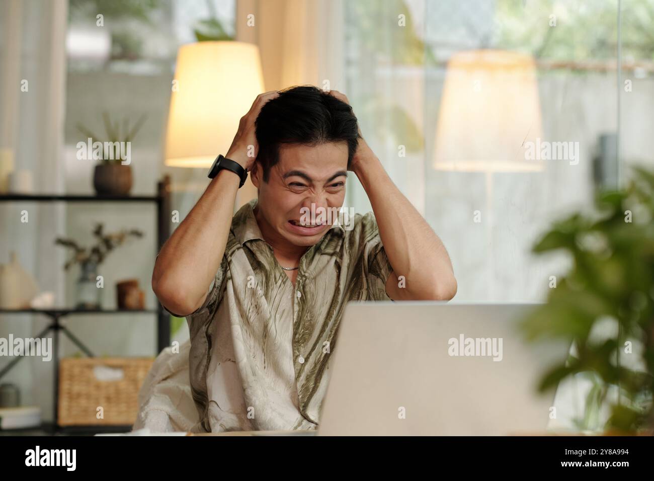 Man Having Problems At Work Stock Photo
