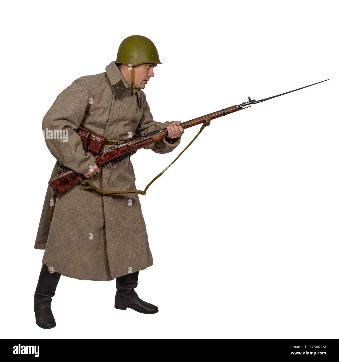 A sergeant of the 10th NKVD Rifle Division attacks in winter uniform ...