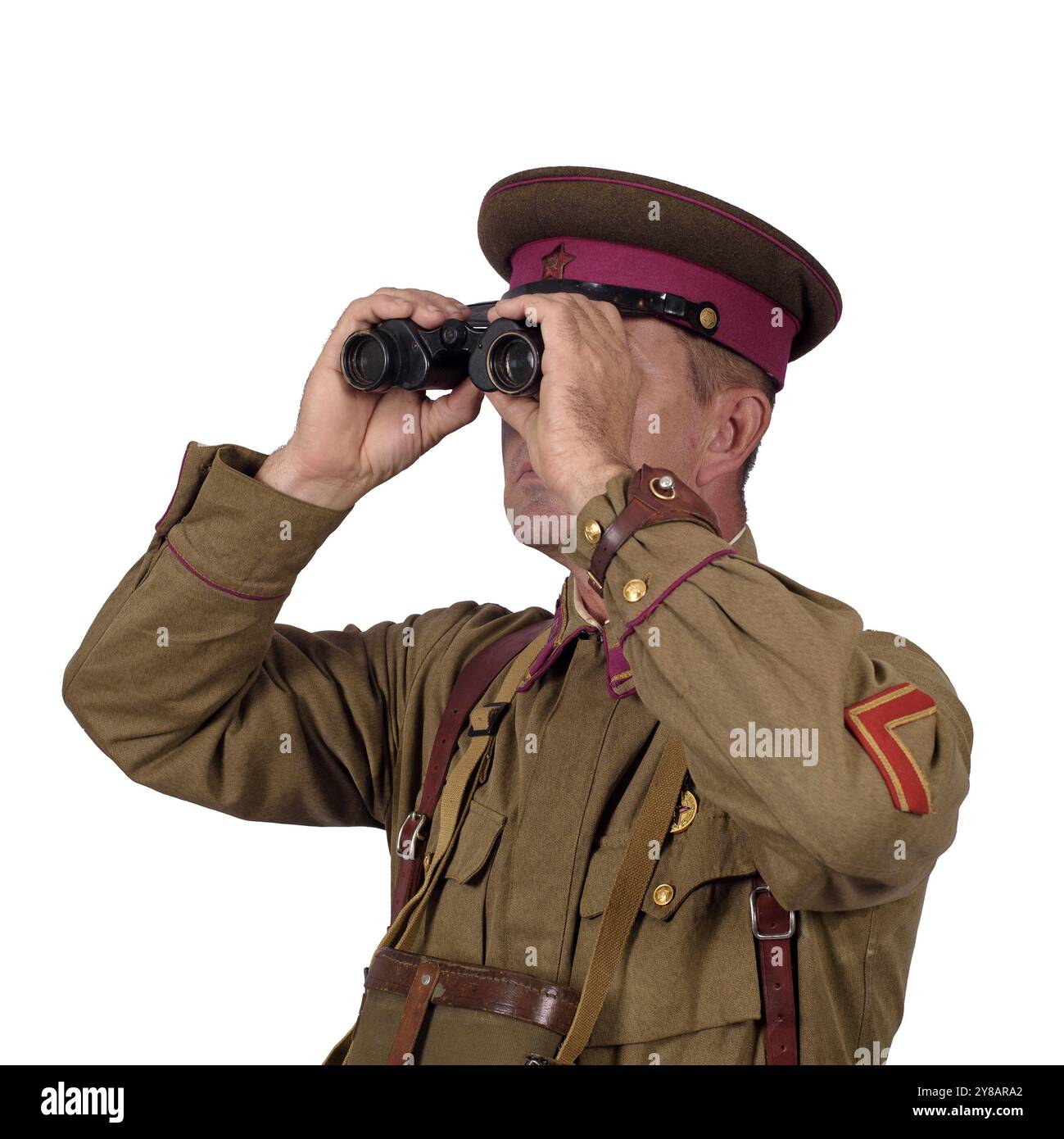 The commander of the Red Army looks through binoculars. Isolated on ...