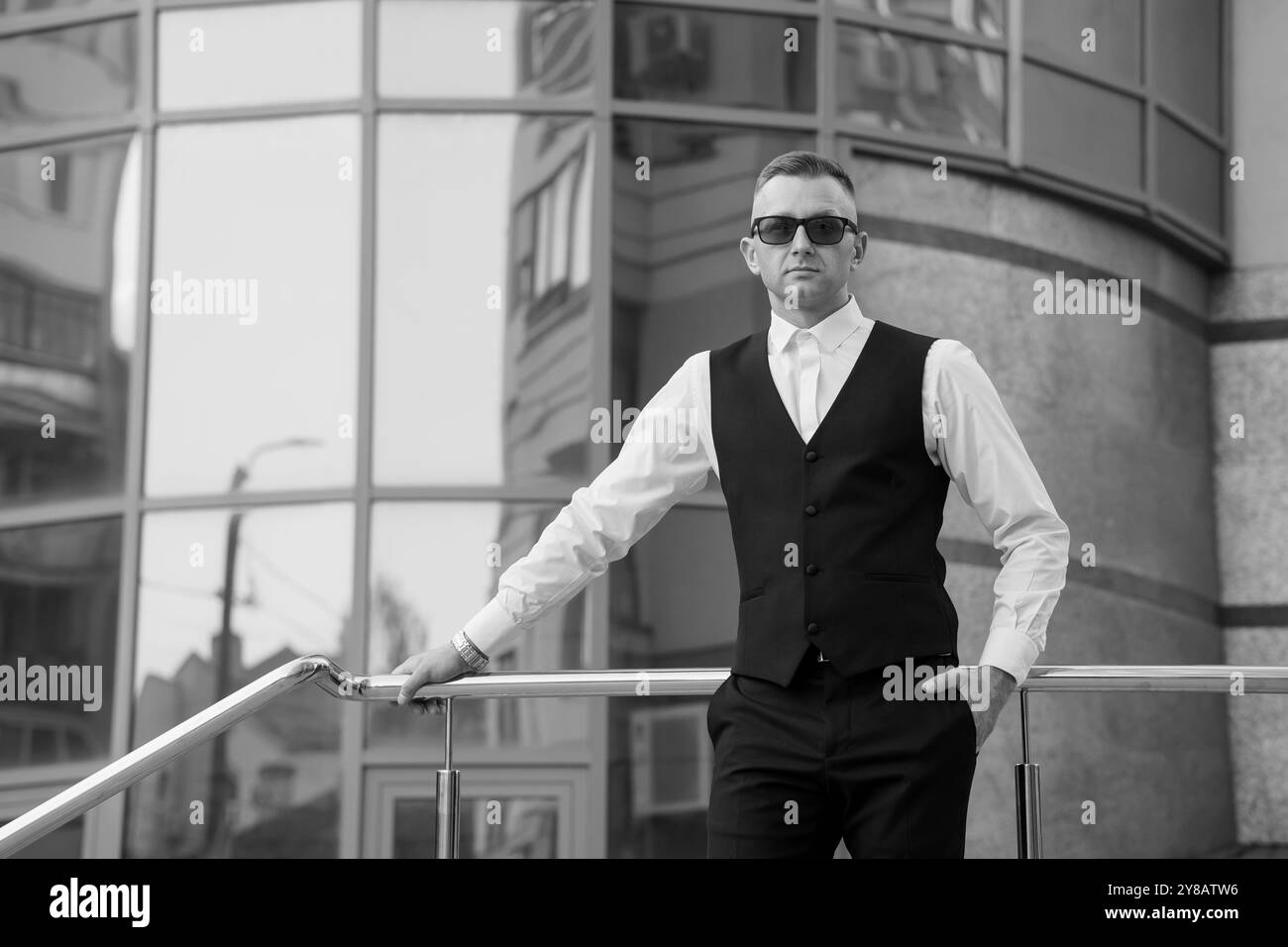 Stylish confident man in sunglasses Black and White Stock Photos ...
