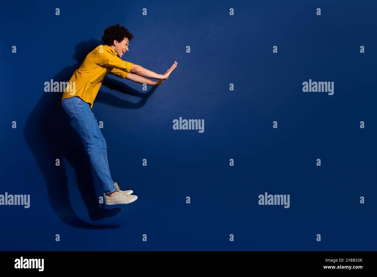 Man Jump Fall Full size photo of nice young man jump fall empty space isolated on ...