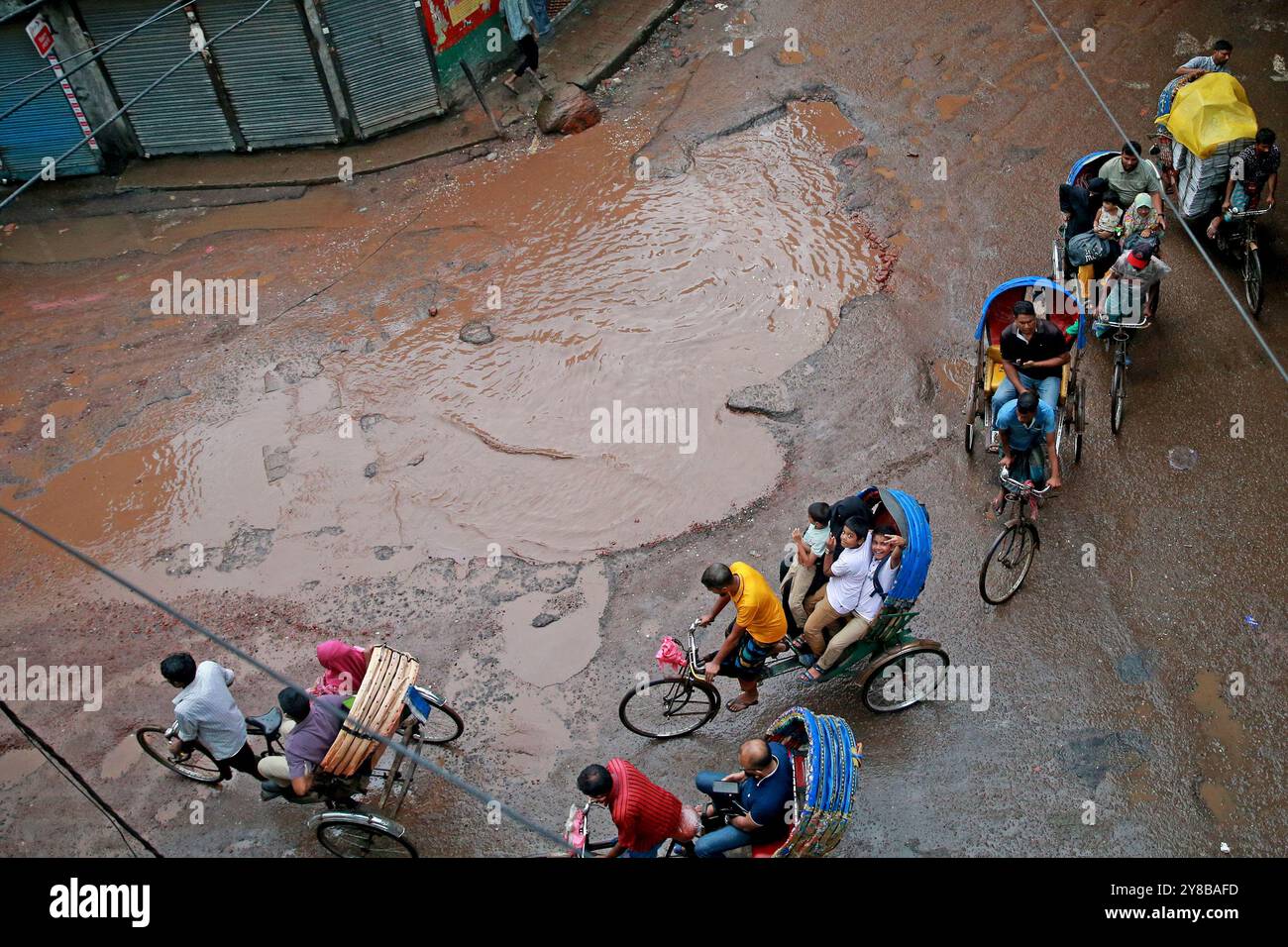 Heavy rains have created large potholes on Jai Kali Mandir road in the capital due to which normal traffic has been disrupted. Stock Photo