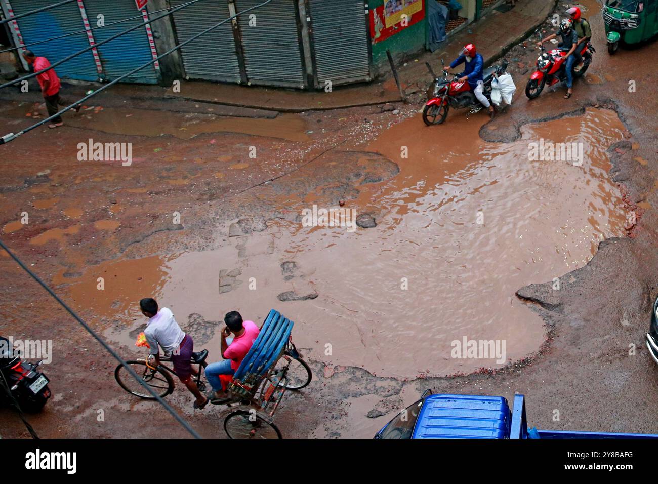 Heavy rains have created large potholes on Jai Kali Mandir road in the capital due to which normal traffic has been disrupted. Stock Photo