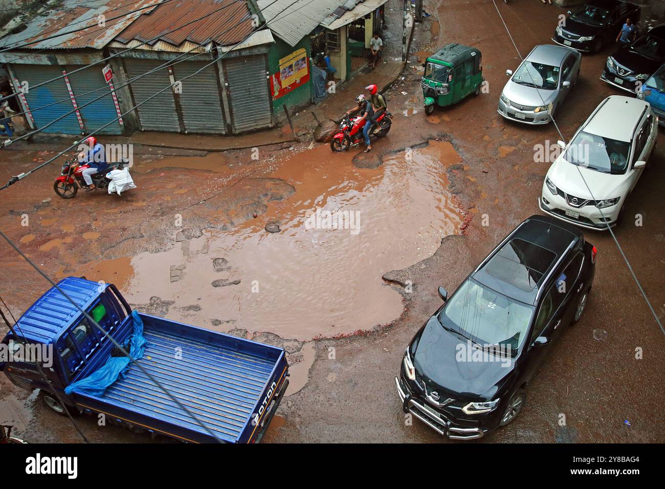 Heavy rains have created large potholes on Jai Kali Mandir road in the capital due to which normal traffic has been disrupted. Stock Photo