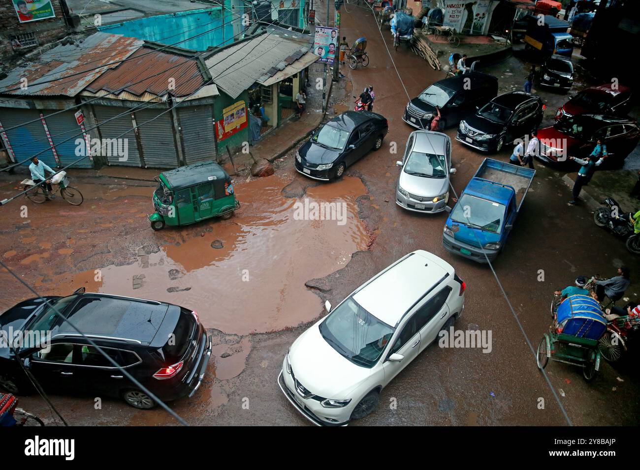 Heavy rains have created large potholes on Jai Kali Mandir road in the capital due to which normal traffic has been disrupted. Stock Photo