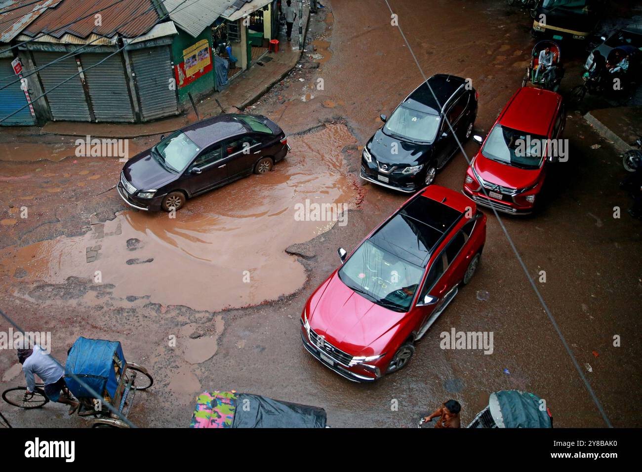 Heavy rains have created large potholes on Jai Kali Mandir road in the capital due to which normal traffic has been disrupted. Stock Photo