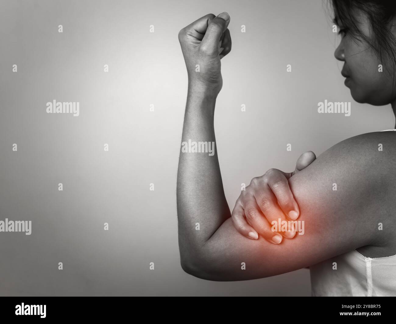 Woman with acute pain elbow with arm pain on gray background, Elbow and ...