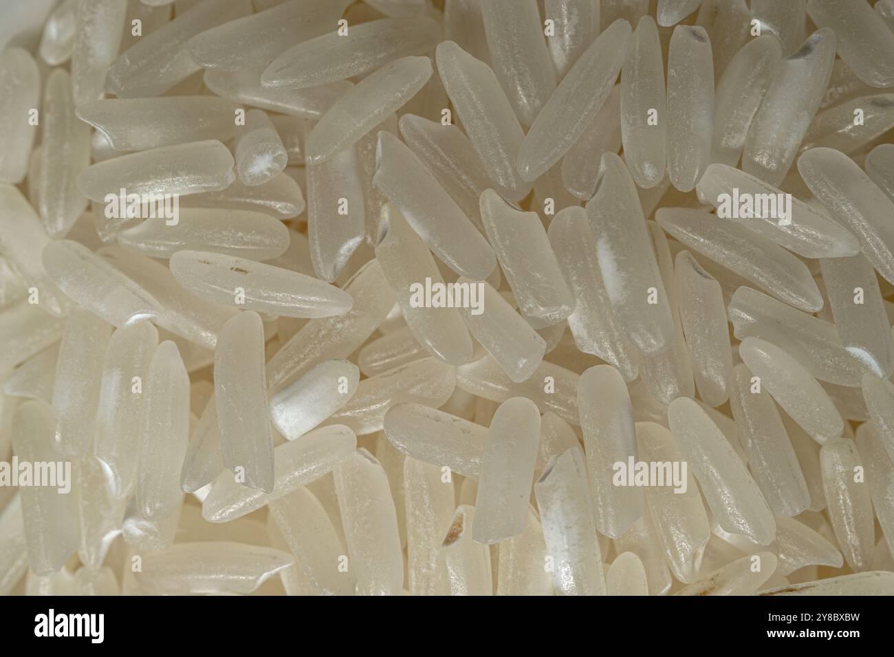 long grain white rise. Raw basmati rice close up , texture , macro ...