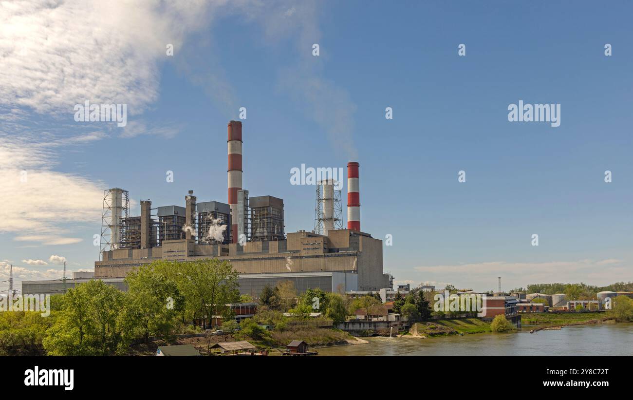 Obrenovac, Serbia - April 04, 2024: Thermal Power Plant Facility in Urovci at River Sava Spring Day. Stock Photo