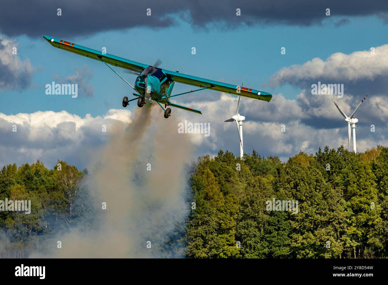 A display of low-flying planes over the airport, ultralight planes, and airplane acrobatics at the show Stock Photo