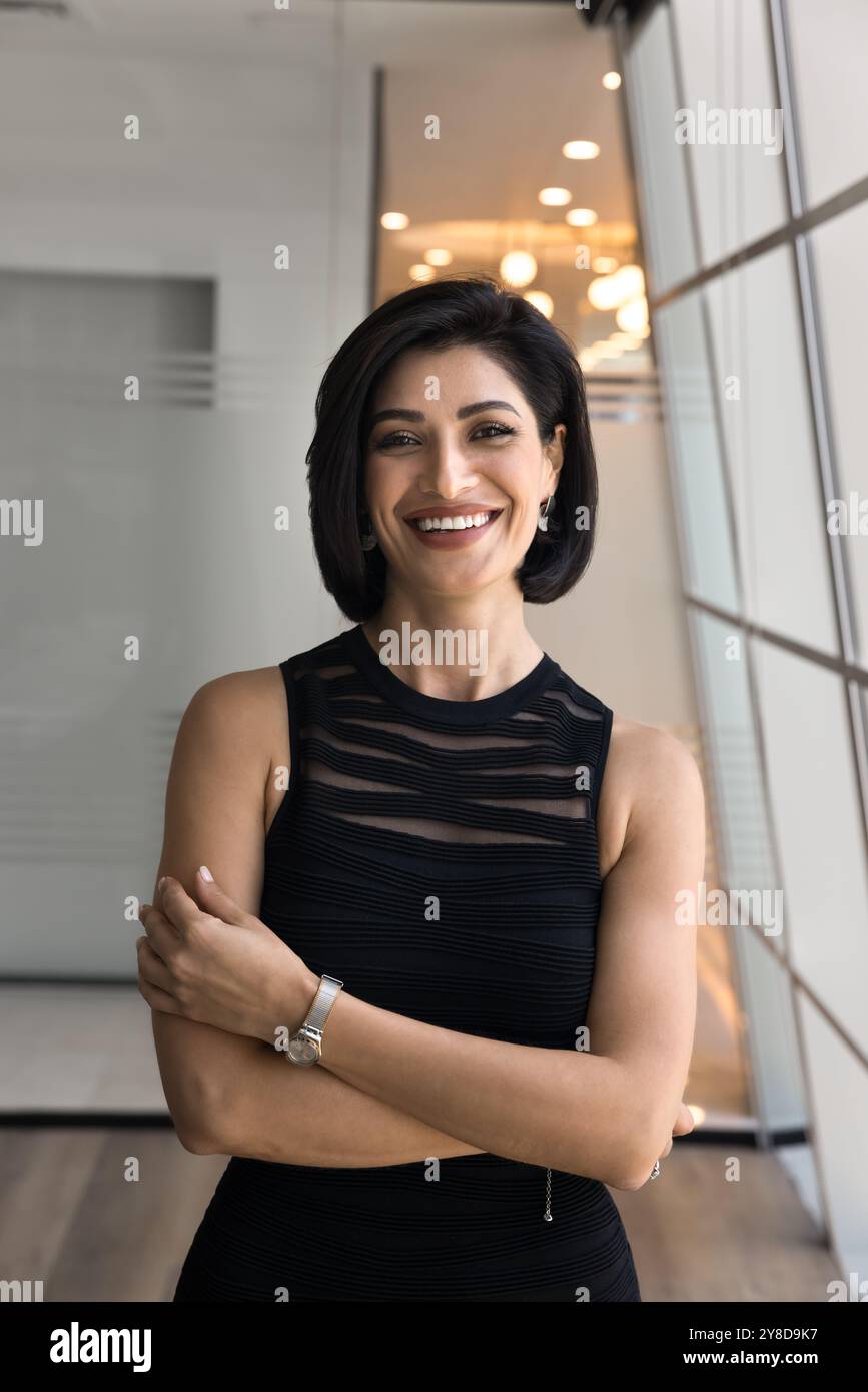 Cheerful female entrepreneur arms hi-res stock photography and images ...