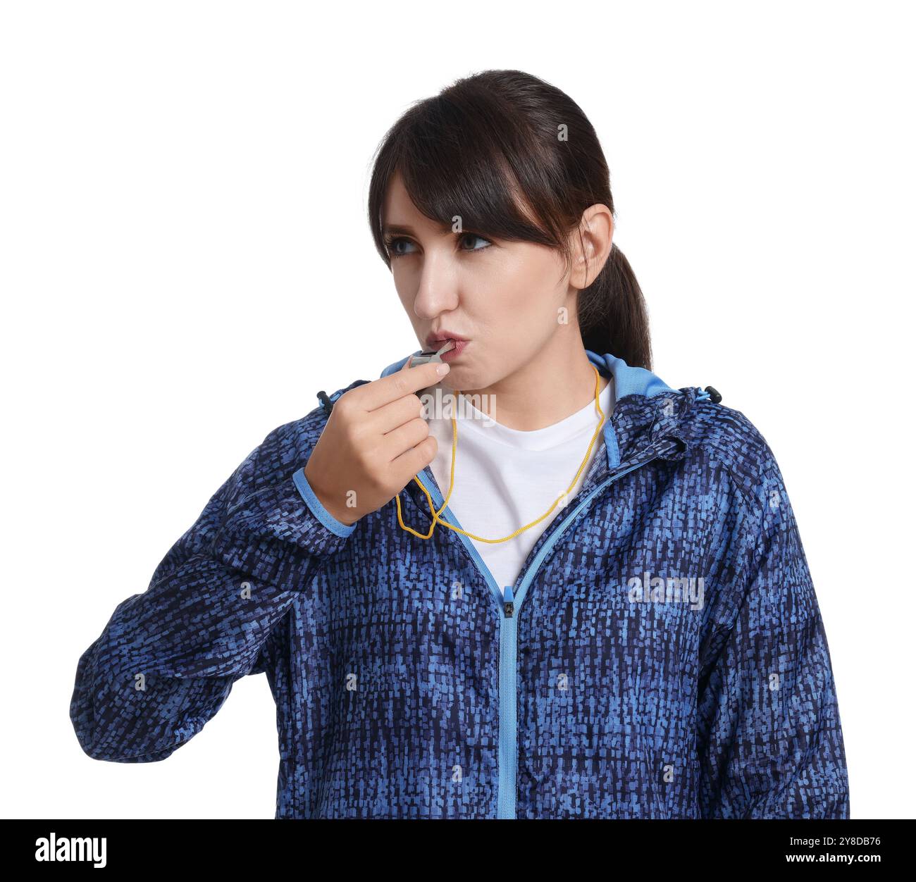 Young woman blowing whistle on white background Stock Photo - Alamy