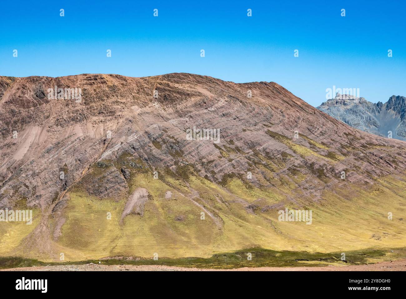 Folded red sandstones form an anticline plunging to the right side in ...